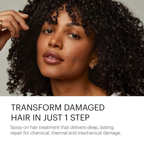 Person with curly hair promoting Repair Treatment Starter Kit For Damaged Hair With Frizz Control, Split End Repair, And Softer, Stronger Hair.