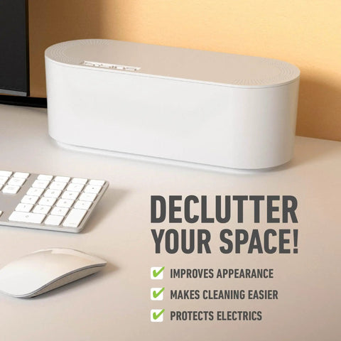 White Cable Management Box For Power Strips Up To 10.5 Inches on desk next to keyboard, focuses on decluttering space.