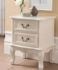 Antique Bronze Cabinet Pulls installed on white vintage dresser with floral decor, showcasing 3.5 inch center hole 88mm handles.
