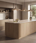 Textured Pendant Light, Cream Aesthetic Hanging Lamp for Kitchen Island over a modern wood and marble kitchen island.