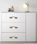 White dresser with Two Pack 6 Inch Vintage Drawer Pulls in Antique Bronze European Style Cabinet Handles installed on drawers.