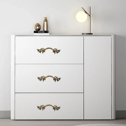 White dresser with Two Pack 6 Inch Vintage Drawer Pulls in Antique Bronze European Style Cabinet Handles installed on drawers.