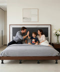 Family enjoying time on a bed with Heavy Duty Adjustable Bed Legs With Grippy Rubber Base Straight Up Reliable Furniture Feet.