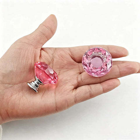 Hand holding Six Pack Pink Crystal Cabinet Knobs 1.2 Inch Diamond Glass Drawer Pulls For Dresser Vanity Bathroom Decor With Screws