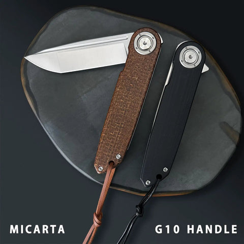 Edc Pocket Folding Knife With 3.5 Inch 14C28N Blade, Micarta handle, and black G10 handle displayed on a stone surface.