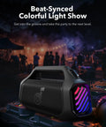 Boom 2 Plus Portable Speaker With 140W BassUp 2.0 in outdoor party setting with RGB lights.