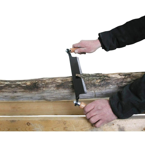 Rugged Straight Draw Shave Tool Featuring A Beefed Up 10 Inch High Carbon Steel Blade Perfect For Log Peeling, used on a log.