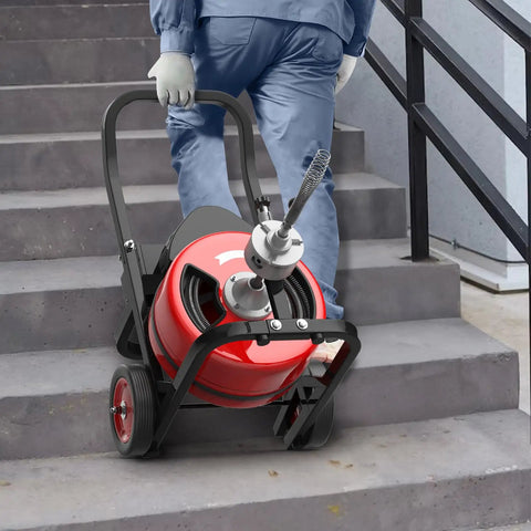 100 Ft Electric Drain Cleaner Machine With 3/4 Inch Steel Core Cable on stairs, showcasing portable design and ease of use.