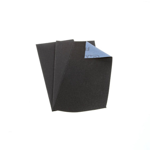 Emery Cloth Sandpaper Set For Metal Surfaces 3 cloth backed sheets with coarse medium and fine grits, black and blue, overlapping.