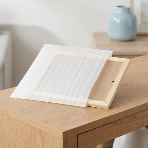 200 Pcs Moving Pro Grade Cushioning Foam Pouches And Sheets 11.8 By 9.8 Inches White Foam Pouch covering frame on table