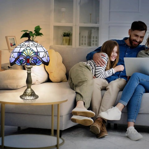 Tiffany Style Blue Stained Glass Table Lamp with family in living room, adds warm ambience, 12x12x19 inches, includes 2 LED bulbs