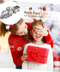 Girl in red sweater giving a gift next to Retro Steam Locomotive Desk Decor for Home Office, Luxury Model Train Ornament