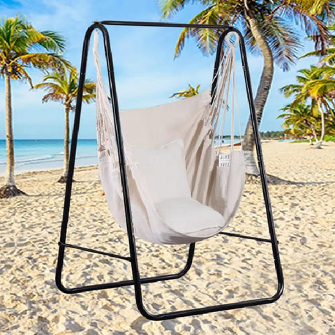 Boho Macrame Hammock Chair Hanging Rope Ceiling Swing For Indoor And Outdoor Use, cozy beach setting, supports up to 330 lbs