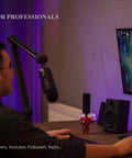 Person using Adjustable Dope Broadcast Microphone Arm With Desk Mount 360 Degree Rotatable Scissor Arm for gaming setup