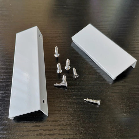 Six Pack Finger Edge Drawer Pull Handles in Bright White for cabinets with mounting screws on dark surface