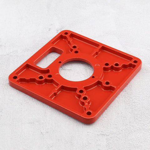 Premium Aluminum Router Table Insert Plate For Heavy Rotary Trimming Tools And Woodworking Engraving Gear Built Rock Solid With Smooth Anti Rust Surface, red plate with mounting holes.
