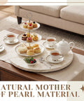 Large 16 Inch Mother Of Pearl Lazy Susan For Tabletop Rotating Turntable Organizer Centerpiece with tea set and pastries.