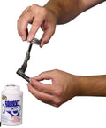 Person applying Heavy Duty Anti Seize Lubricant 8 Oz Case Of 12 Keeps Bolts From Seizing Under Heat And Rust With Long Lasting Adhesion