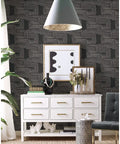 Room with Nikki Chu Black And White Zulu Signature Peel And Stick Wallpaper Roll for easy decor, featuring bold modern patterns.