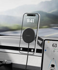 Qi2 15W Magnetic Wireless Car Charger For Tesla Dash Mount Super Fast Charging Hub with iPhone mounted on it.