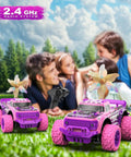Pink Purple 1:20 Scale RC Monster Truck With LED Lights And DIY Windmills in outdoor play, family in the background
