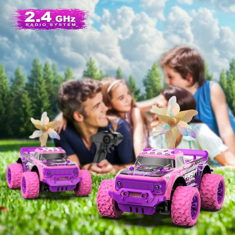 Pink Purple 1:20 Scale RC Monster Truck With LED Lights And DIY Windmills in outdoor play, family in the background