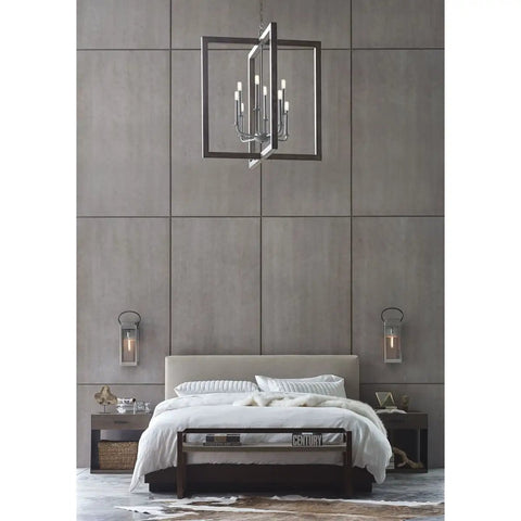 Bedroom with modern chandelier and wall lanterns on wooden panel wall, featuring Union Square Collection 1-Light Outdoor Wall Lantern.