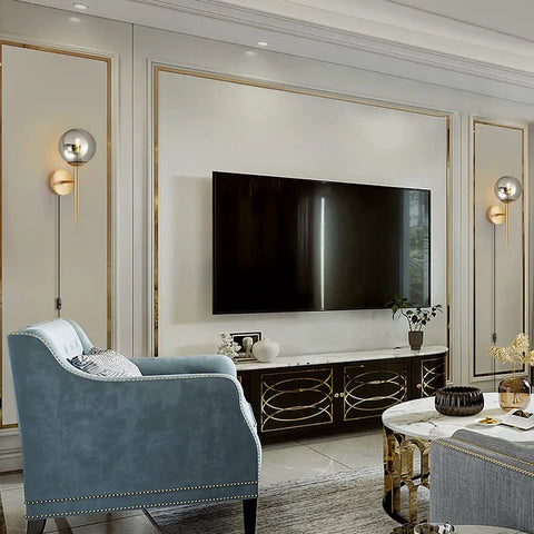 2 Light Plug In Globe Wall Sconce With Smoky Gray Glass Shade And Brass Finish Delivers A Cozy Vibe And Soft Glow For Bathroom Bedroom Hallway Corridor Modern Bedside Lighting in elegant living room.