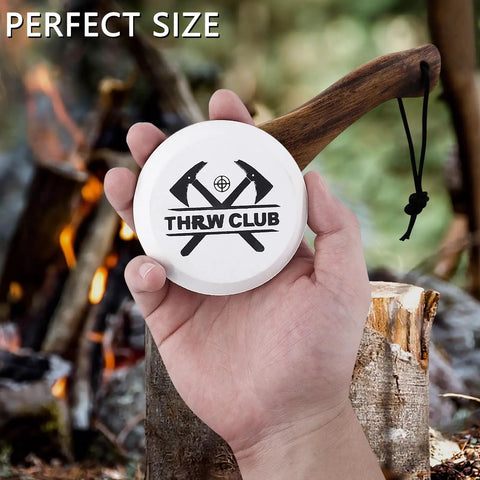 Person holding Dual Grit Axe Sharpener Stone 400 1000 for hatchets and axes with leather sheath, multipurpose sharpening puck.