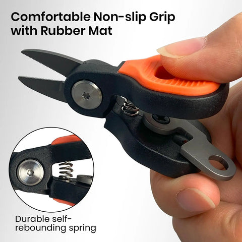 Mini Fishing Scissors Line Cutter Kit with compact stainless steel blades and non-slip handle in hand, close-up view.