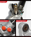 Close-up of hydraulic power steering rack and pinion assembly input shaft, pressure ports, and mounting holes for Honda Accord 1998-2002 2.3L 3.0L and Acura CL 2001-2003 3.2L.