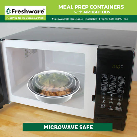 30 Pack Meal Prep Bowls With Lids, 28 Oz Containers For Soup And Salad, BPA Free in microwave showing heating use