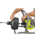 Powerful 18V Cordless Drain Auger Kit With 50 Ft Reel, 2Ah Battery, Charger, pivoting drum in use for plumbing tasks.