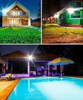 JUDYSSY 100W Led Solar Flood Lights illuminating outdoor spaces around a house, green cabin, and pool area at night.