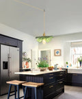 Eemmwet Green Plug in Pendant Light Handmade Glass Hanging Light for Kitchen Island Bedroom Dining Room Living Room in modern kitchen setting.