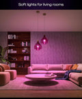 Smart Home Starter Kit With Bridge Pro And Four A19 And E26 Smart Bulbs illuminating a cozy living room with purple ambiance lighting.