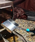 Ash Shovel For Fire Pit And Fireplace Charcoal Scoop Stainless Steel 14.6 Inch Handle shown scooping ashes from fire pit