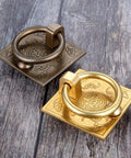 Antique Bronze Brass Cabinet Door Handle 2pc Set For Cabinets Drawers Cupboards With Chinese Drop Style Design on wood surface