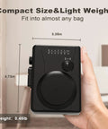 Hand holding Portable Cassette Player And Tape Recorder With Cassette To MP3 Converter, AM FM Radio, black, 3.35x4.73 inches