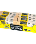 Rock Solid Wood Shims Pack Of Twelve Beddar Wood Door And Cabinet Leveling Wedges stacked in a yellow box, ideal for leveling and gap adjustments.