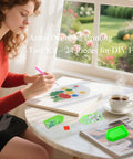 Person using Diamond Painting Tools Kit With 24 Piece Accessories Including 8 Drill Pens 8 Trays And 8 Wax Pads For 5D Art