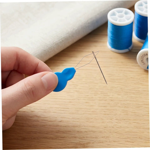 Gourd Shaped Needle Threaders 100 Pack Plastic Threading Tools For Hand Sewing And Embroidery, Effortless Threading, Versatile Use For Travel, Grab And Go DIY Crafts, And Quick Needle Tasks in hand