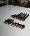 Dope 15 PCS Tig Back Cap Kit Fits Wp 17 18 26 Torch With Brass Bakelite Rubber Covers on stainless table.