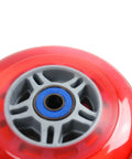 Close-up of red 100mm scooter wheel with ABEC 7 bearing, suitable for Razor and most scooters, 88A urethane high rebound.
