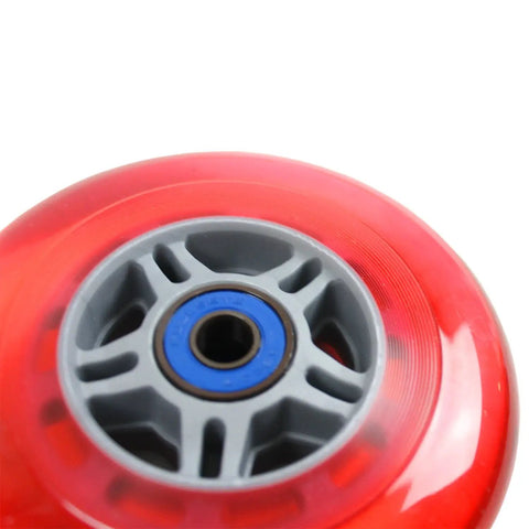 Close-up of red 100mm scooter wheel with ABEC 7 bearing, suitable for Razor and most scooters, 88A urethane high rebound.