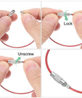 Hands demonstrating how to lock and unscrew 50 Pack Wire Keychain Cables 12 Inch Plastic Coated 1.5mm Stainless Steel Key Ring Loops
