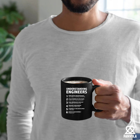 Man holding Funny Engineer Gifts Ceramic Mug 11 Oz Black For Engineers Engineering Students Teachers Dads