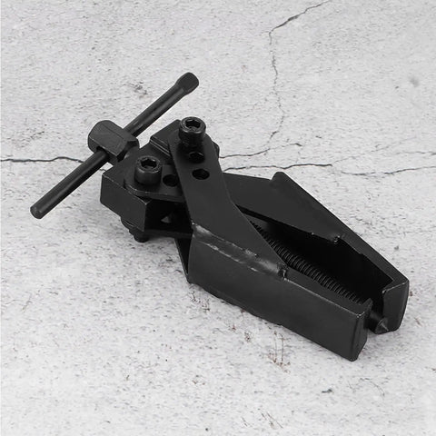 2 Claw Small Bearing Puller With Separate Lifting Device And Screw Rod for wheel bearing removal, black, on concrete surface