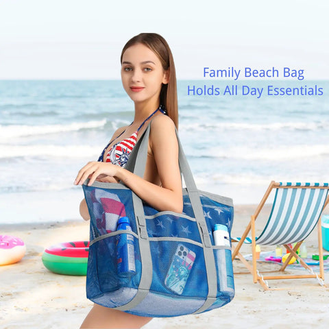 Woman holding Big Mesh Beach Bag For Fam Trips Fits Four To Six Towels Water Bottles Sunscreen And Gear Nine Pockets For Anti Chaos Organization Ideal For Beach Pool Cruise And Summer Fun.