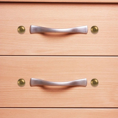 Top Shelf Brass Decorative Screws 24 Pack 15Mm Upholstery Tacks on drawer with silver handles and brass caps.